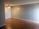 Spacious living room with wood floors at 10792 E Exposition Ave Ave # 254, Aurora, CO 80012