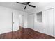 Bedroom with wood floors, closets and ceiling fan offers comfortable and functional living at 5721 W 92Nd Ave # 52, Westminster, CO 80031