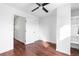 Bedroom with wood floors, closet and ceiling fan offers comfortable and functional living at 5721 W 92Nd Ave # 52, Westminster, CO 80031