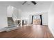 Bright and airy living room with high ceilings, access to the patio, and modern plank flooring at 5721 W 92Nd Ave # 52, Westminster, CO 80031