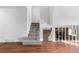 Inviting living room showcasing a brick fireplace and staircase, perfect for entertaining guests or relaxing by the fire at 5721 W 92Nd Ave # 52, Westminster, CO 80031