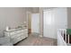 Bedroom featuring an armoire and view of a large closet space at 7809 Bandit Dr, Castle Rock, CO 80108