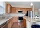 Spacious kitchen featuring stainless steel appliances, granite countertops, and ample cabinet space at 7809 Bandit Dr, Castle Rock, CO 80108