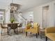 Cozy living room features a staircase, comfortable seating, and natural light at 2755 Geneva St, Denver, CO 80238