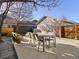 Outdoor patio featuring a dining set and lounge furniture perfect for entertaining or relaxing in the backyard at 2755 Geneva St, Denver, CO 80238