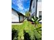 Backyard featuring a lush green lawn, privacy fence and a small seating area at 2831 Shadow Lake Rd, Lafayette, CO 80026