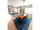 Open concept kitchen and dining area with modern appliances and a stylish island at 2831 Shadow Lake Rd, Lafayette, CO 80026