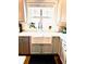 Bright kitchen sink area with stainless steel appliances and natural light from the window at 2831 Shadow Lake Rd, Lafayette, CO 80026