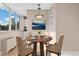 Charming dining area with a round table and built-in shelving at 1196 N Grant St # 501, Denver, CO 80203
