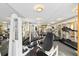 Well-equipped gym with various exercise machines and natural light at 1196 N Grant St # 501, Denver, CO 80203