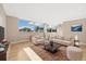 Living room featuring contemporary furniture, stylish decor, and city views at 1196 N Grant St # 501, Denver, CO 80203