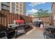 Cozy patio area with grilling stations and seating for outdoor dining at 1196 N Grant St # 501, Denver, CO 80203