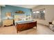 Bedroom featuring natural light from a large window, complemented by stylish decor at 2122 Montane Dr, Golden, CO 80401