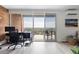 Bright room featuring workspace, opening to a private balcony with expansive views at 955 Eudora St # 1606, Denver, CO 80220