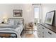 Serene bedroom featuring soft natural light, comfortable furnishings, and a calming aesthetic at 955 Eudora St # 1606, Denver, CO 80220