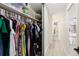 Walk-in closet with ample hanging space and shelving for organized storage of clothing and accessories at 955 Eudora St # 1606, Denver, CO 80220