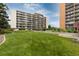Expansive lawn area, complemented by well-maintained landscaping that enhances the building's curb appeal at 955 Eudora St # 1606, Denver, CO 80220