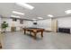 The game room features a classic pool table, perfect for recreation and entertaining guests at 955 Eudora St # 1606, Denver, CO 80220