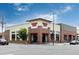 Exterior view of a neighborhood Trader Joe's store with red accents and ample parking at 955 Eudora St # 1606, Denver, CO 80220