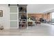 Well-organized pantry featuring sliding door, shelving, and ample storage for food and kitchen essentials at 955 Eudora St # 1606, Denver, CO 80220
