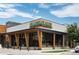 The modern restaurant exterior boasts stylish architectural design and eye-catching signage, located in a vibrant setting at 955 Eudora St # 1606, Denver, CO 80220