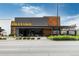 Exterior view of Postino restaurant on a sunny day, with attractive signage and landscaping at 955 Eudora St # 1606, Denver, CO 80220