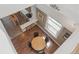 Aerial view of a home showcasing the kitchen, dining area, and hardwood floors at 1686 S Logan St, Denver, CO 80210