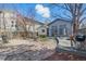 Backyard with an outdoor grill, rock garden, and landscaped patio, perfect for gatherings at 1686 S Logan St, Denver, CO 80210