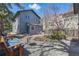 Backyard with patio area, landscaping, and a two-story house, perfect for outdoor entertaining at 1686 S Logan St, Denver, CO 80210