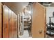 Basement storage room with shelving and a doorway, ideal for organizing household items at 1686 S Logan St, Denver, CO 80210