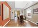 Open-concept dining area with hardwood floors, great for entertaining at 1686 S Logan St, Denver, CO 80210