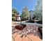 Charming two-story home featuring mature trees, well-maintained landscaping, and a welcoming stone pathway at 1686 S Logan St, Denver, CO 80210