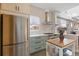 Well-designed kitchen showcases stainless appliances and modern finishes at 1686 S Logan St, Denver, CO 80210