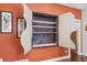 Unique shelving provides visual interest in a brightly painted room at 1686 S Logan St, Denver, CO 80210