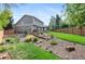 Beautiful backyard with a gazebo, lush landscaping, and a well-maintained lawn at 11076 Cotton Creek Dr, Westminster, CO 80031