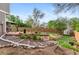 Expansive backyard featuring a gazebo, storage shed, and diverse landscaping at 11076 Cotton Creek Dr, Westminster, CO 80031