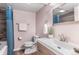 Bathroom features a modern vanity, toilet, and shower with a shower curtain at 11076 Cotton Creek Dr, Westminster, CO 80031