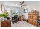 Functional home office with ample desk space, natural light, and a quiet atmosphere at 11076 Cotton Creek Dr, Westminster, CO 80031