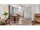 Open floorplan living room featuring a dining area and seamless flow into the kitchen at 11076 Cotton Creek Dr, Westminster, CO 80031