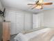 Comfortable main bedroom with multiple closets, neutral decor, and a relaxing atmosphere at 11076 Cotton Creek Dr, Westminster, CO 80031