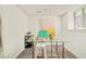Bright basement office with a transparent work desk and great natural light at 2990 Osceola St, Denver, CO 80212