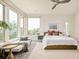 Spacious bedroom featuring scenic views, neutral decor, and plush carpet at 2990 Osceola St, Denver, CO 80212