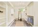 A walk in closet with a full length mirror, bench and ample shelving at 2990 Osceola St, Denver, CO 80212