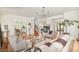 Bright and spacious living room with hardwood floors, fireplace, and elegant modern decor at 2990 Osceola St, Denver, CO 80212
