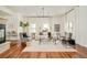 Bright living room featuring hardwood floors, a fireplace, and modern furniture ideal for relaxation at 2990 Osceola St, Denver, CO 80212