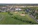 Aerial view of the community showcasing nearby park, recreational fields, and easy access to local amenities at 874 Mercury Cir, Lone Tree, CO 80124