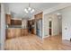 Bright kitchen with a central island, stainless steel appliances, and wood cabinetry at 874 Mercury Cir, Lone Tree, CO 80124