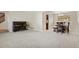 Expansive living space with neutral carpet, piano, and dining area at 874 Mercury Cir, Lone Tree, CO 80124