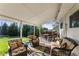 Covered patio with comfortable seating and outdoor dining offers a relaxing backyard experience at 874 Mercury Cir, Lone Tree, CO 80124