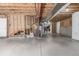 Unfinished basement with exposed framing, ductwork, and concrete floor at 20148 E Windy Pine Pl, Parker, CO 80134